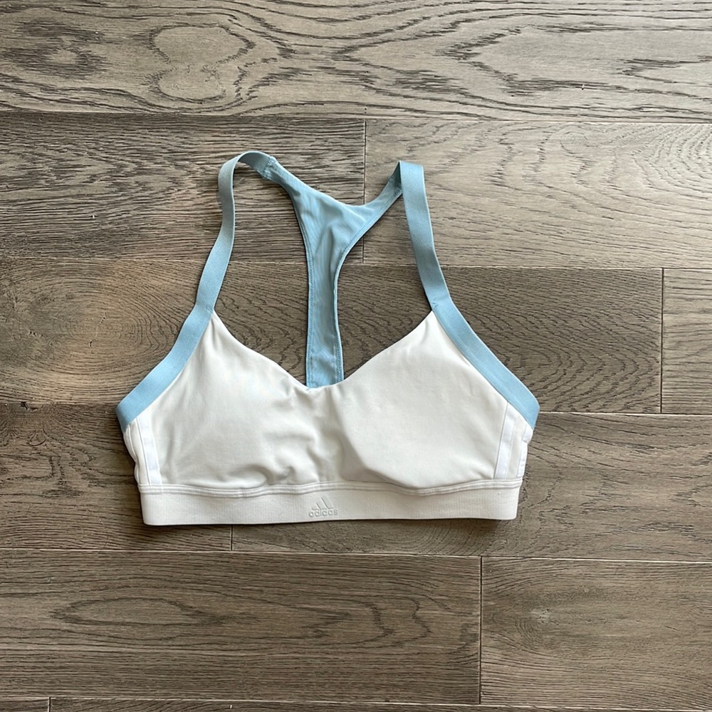 Adidas light blue and cream sports bra, size medium.